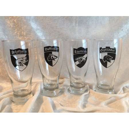Harry Potter four piece set of 16oz Pint Glasses in four Houses, Hufflepuff, Griffindor, Ravenclaw and Slytherin thumb